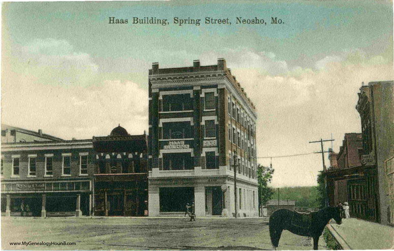 Haas Building on Spring Street, Neosho, Missouri. This building was built in 1906 and is located on the northeast corner of the courthouse